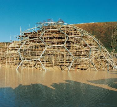 Eden Project Biome structure during construction, with rain